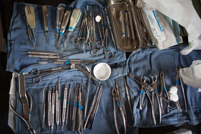 Dental instruments, cleaned with water and water, lie ready for the next wave of children visiting the makeshift clinic during a medical relief operation near Guiuan, East Samar, Philippines.