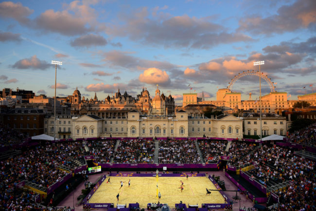 Donald Miralle (American, born 1974). Men's Beach Volleyball match between Brazil and Canada, London Olympics, The Horse Guards Parade ground, London, 2012. Archival inkjet print, 40 x 60 in. (101.6 x 152.4 cm). Leucadia Photoworks Gallery, courtesy of the artist